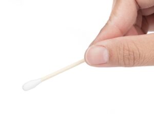 Saturate a clean Q-Tip with your blend of essential oils, and apply neat (undiluted) on affected area two times a day.