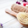 Improve skin appearance and health by using dry brushing and essential oils for cellulite.